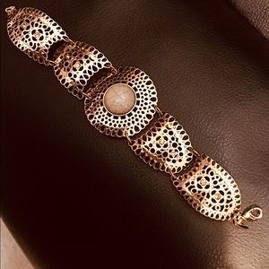 SHB gold tone bracelet